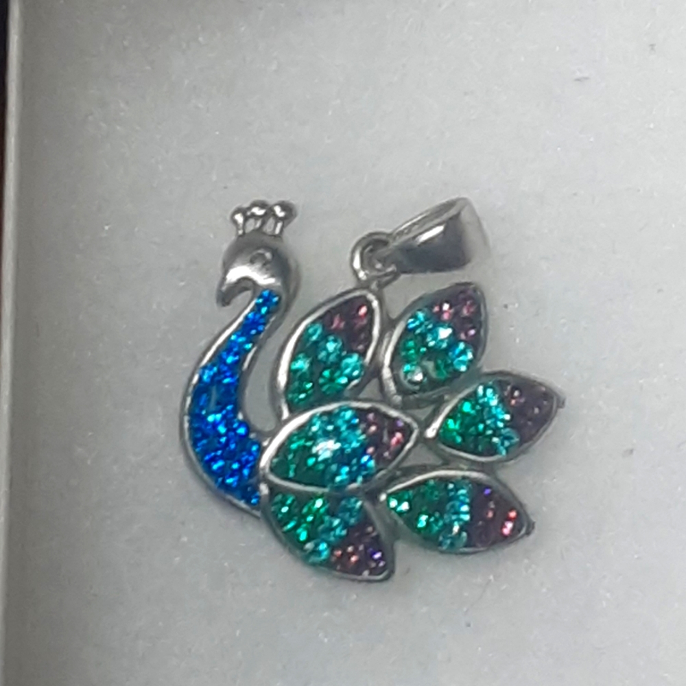 Peacock with beautiful colored stones